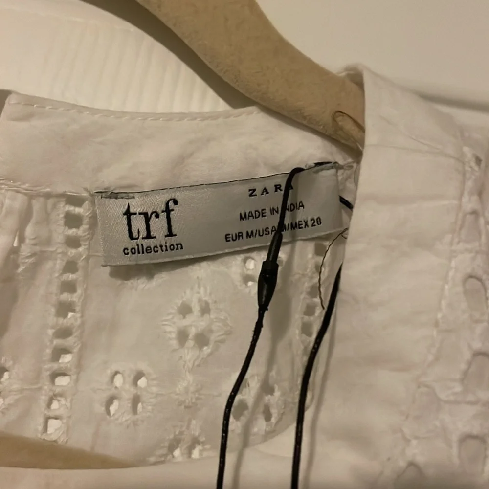 Med white tunic